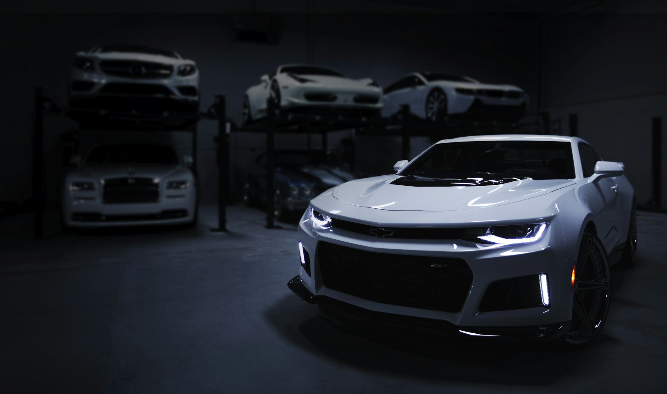 Sculpted lines and reflections across a premium car body